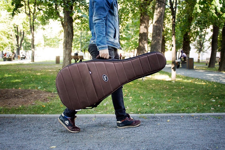 перевезти гитару